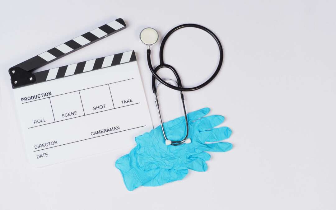 Medical experts represented by a film clapperboard, stethoscope, and surgical gloves, symbolizing medical accuracy in filmmaking.